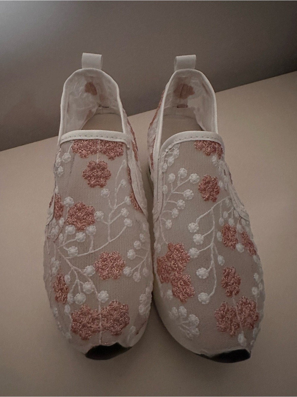 Sheer and embroidered wedge slip on